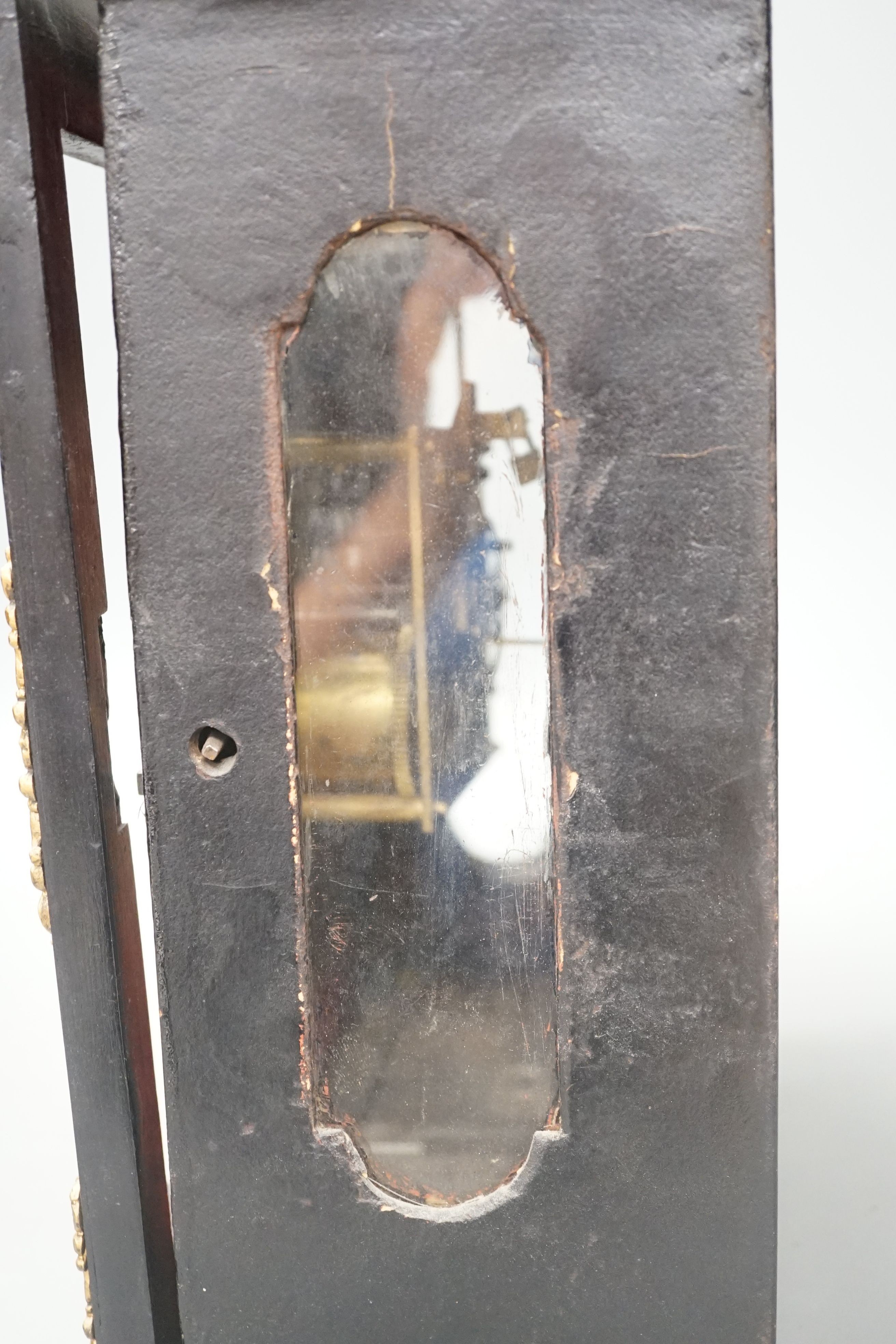 A 19th century replica of a 17th century Religieuse clock, 38cm